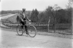 1924-Man-on-Bicycle-784A