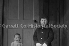 0548-Child-with-Doll44B48C